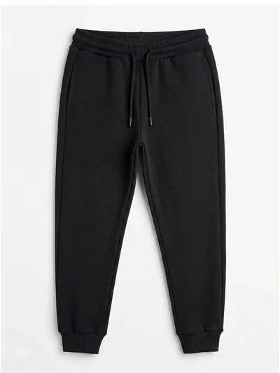 Paçası Lastikli Unisex Çocuk Siyah Jogger Eşofman Altı